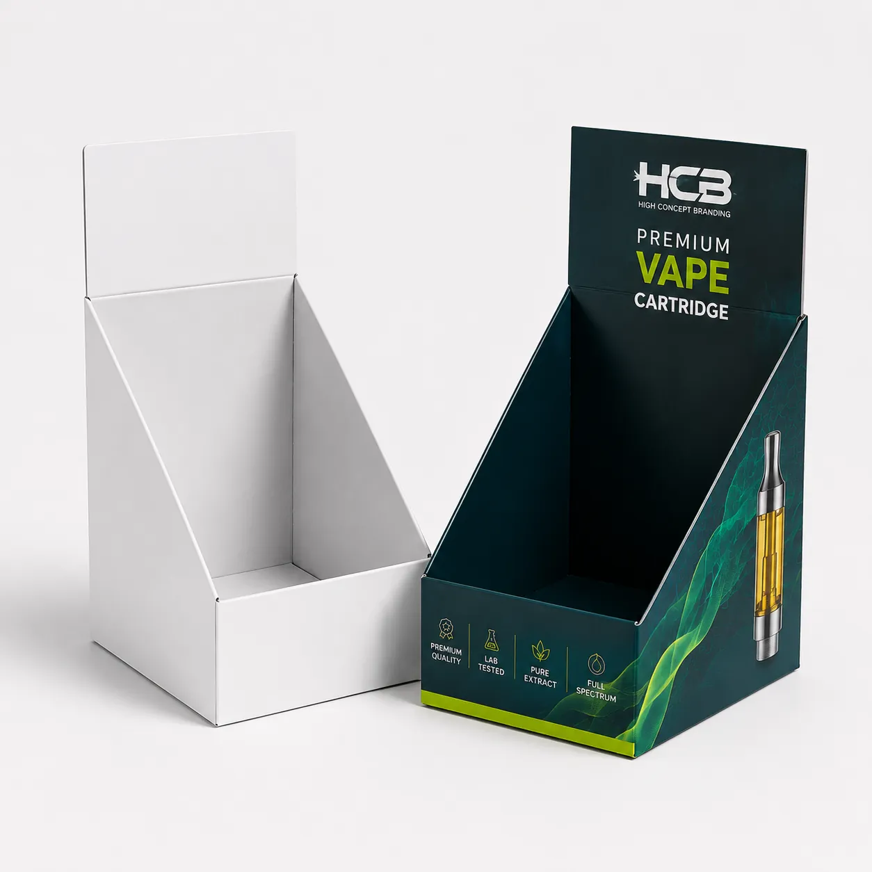 Custom printed cardboard counter display boxes for wholesale vape cartridges beside a blank white sample. class=